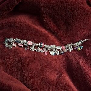 Linx bracelet with travel themed charms